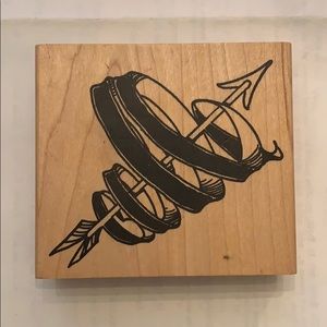 Arrow with swirled ribbon rubber stamp